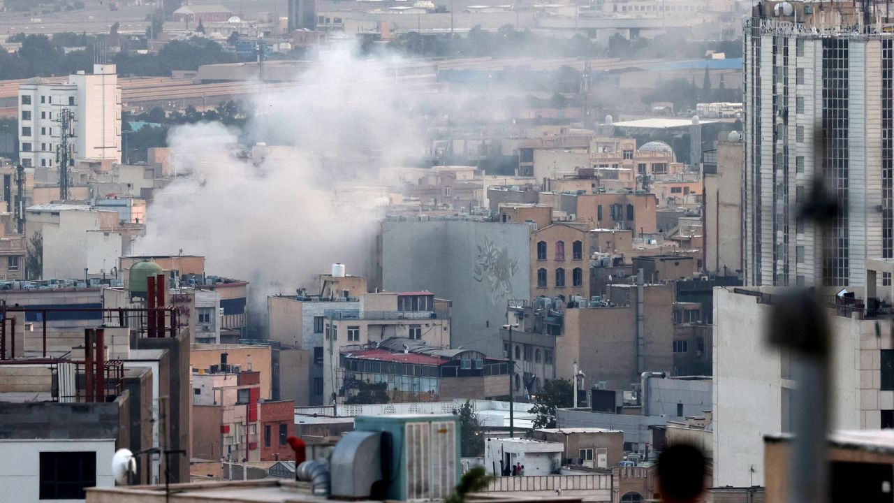 Smoke billows from an explosion in southwest Tehran on June 16, 2025.