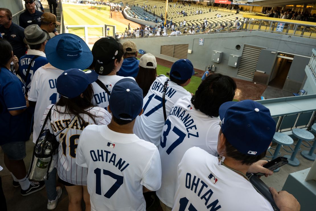 Los Angeles, CA - June 16:Dodger fans crowd around the Dodger bullpen hoping for a glimpse of Shohei Ohtani before the start of the game against the Padres at Dodger Stadium on Monday, June 16, 2025.  Ohtani is scheduled to make his pitching debut as a Dodger on Monday.  (Photo by David Crane/MediaNews Group/Los Angeles Daily News via Getty Images)