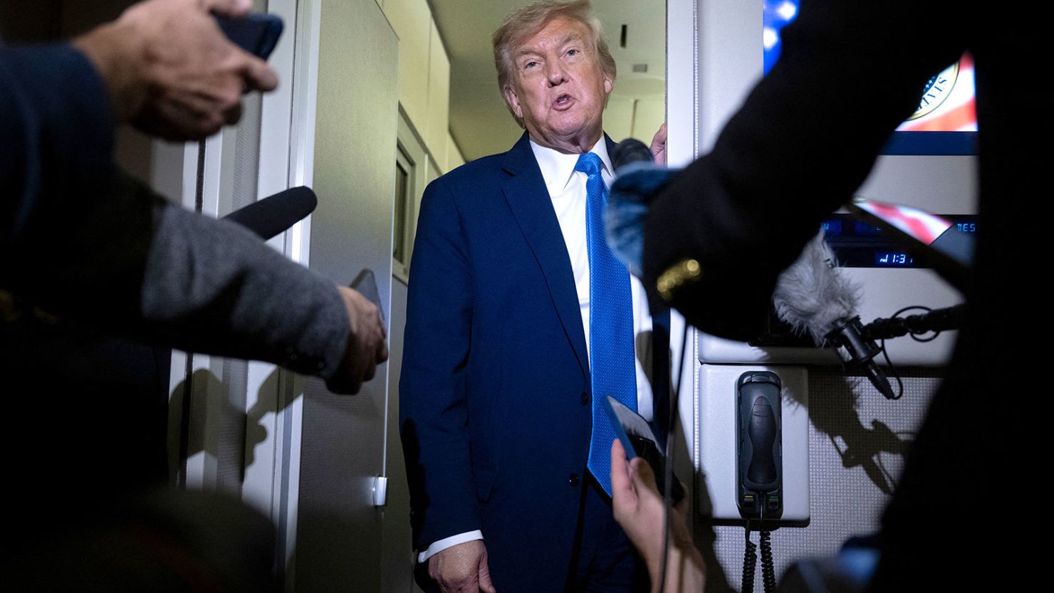 US President Donald Trump speaks to reporters about the G7 Summit aboard Air Force One while travelling back to Washington from Canada on June 16, 2025.
