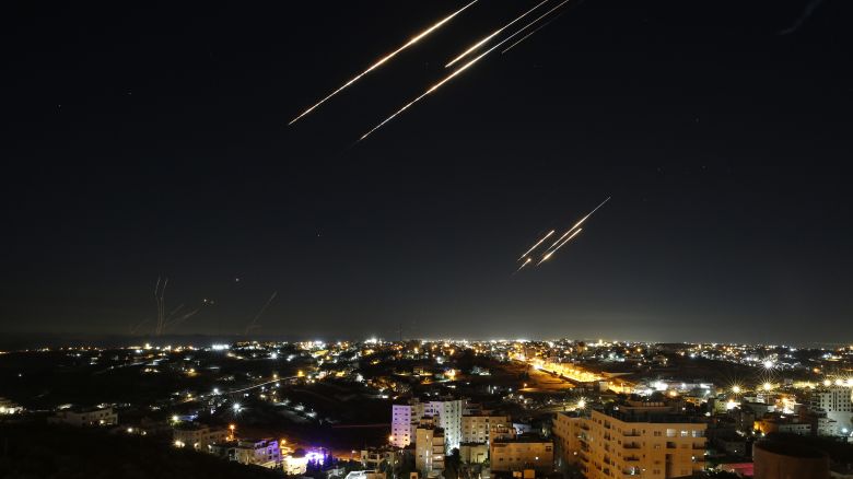 HEBRON, WEST BANK - JUNE 18: Missiles fired from Iran are seen streaking across the skies over the city of Hebron in the West Bank on June 18, 2025. Iran, which Israel continued to attack, launched a new retaliatory attack with around 25 missiles in two successive attacks. (Photo by Wisam Hashlamoun/Anadolu via Getty Images)