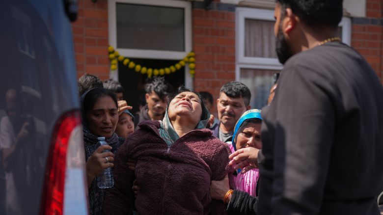 The mother of both Vishwash Kumar Ramesh, the sole British survivor of the Air India Ahmedabad Airport crash and his brother Ajay Ramesh, who is believed to not have survived, boards a mini bus to travel to India on June 13, 2025 in Leicester, United Kingdom. At least 53 of the passengers Air India Flight 171, which crashed shortly after takeoff on its way from Ahmedabad to London Gatwick, were British nationals. The sole survivor is a British man, Vishwash Kumar Ramesh. A total of 241 passengers and crew were reported to have died, plus others who were in a building hit by the plane.