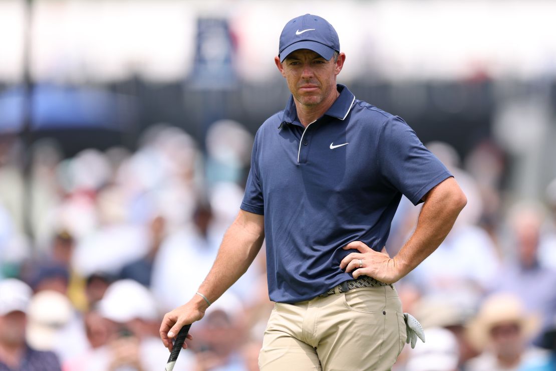 Rory McIlroy of Northern Ireland looks on while playing the first hole during the second round.
