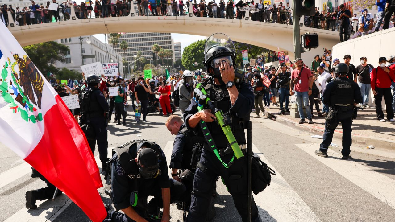 LOS ANGELES, CA - JUNE 14: Protesters face off with police outside of a federal building in downtown Los Angeles for an anti-Trump