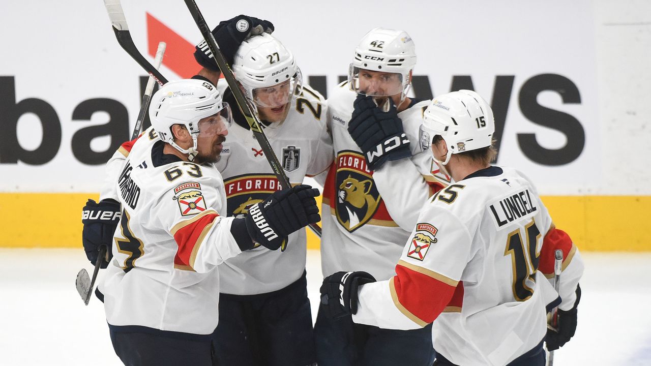 Eetu Luostarinen of the Florida Panthers celebrates a goal against the Edmonton Oilers with teammates Brad Marchand, Gustav Forsling and Anton Lundell of the Florida Panthers during the third period in Game Five of the 2025 Stanley Cup Final at Rogers Place on June 14, 2025 in Edmonton, Alberta, Canada.