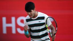 Carlos Alcaraz reacts against Jaume Munar during their men's singles round of 16 tennis match at the HSBC ATP tennis Championships at Queen's Club in west London on June 19, 2025.