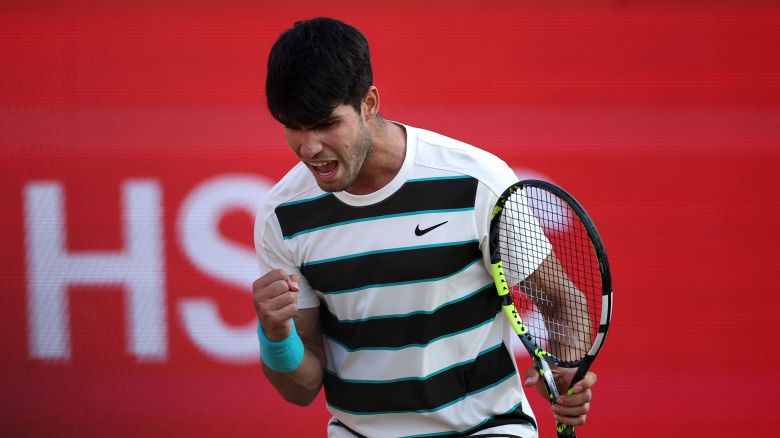 Carlos Alcaraz reacts against Jaume Munar during their men's singles round of 16 tennis match at the HSBC ATP tennis Championships at Queen's Club in west London on June 19, 2025.