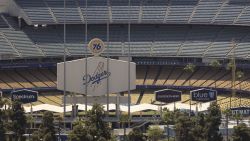 An overview of Dodgers Stadium is seen in Los Angeles, California on June 19, 2025. Federal immigration agents were barred from entering Dodger Stadium on June 19 after requesting access to the Major League Baseball team's grounds, the team confirmed. US Immigration and Customs Enforcement (ICE) agents arrived at the stadium and "requested permission to access the parking lots," the Dodgers said in a statement. (Photo by ETIENNE LAURENT / AFP) (Photo by ETIENNE LAURENT/AFP via Getty Images)          