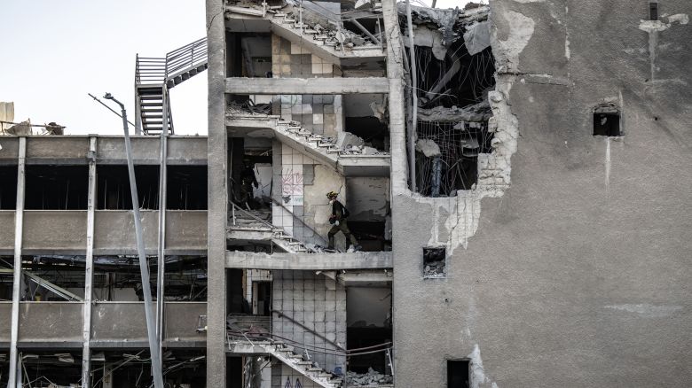 HAIFA, ISRAEL - JUNE 20: Police and civil defense conduct operations in the area following the missile fired from Iran that struck the city of Haifa in northwestern Israel on June 20, 2025. (Photo by Mostafa Alkharouf/Anadolu via Getty Images)