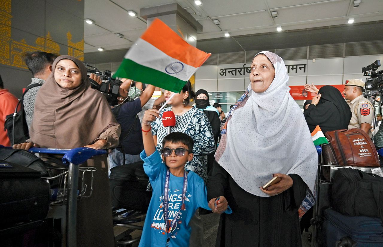 Indian nationals evacuated from Iran arrive at Delhi airport on June 22, 2025.