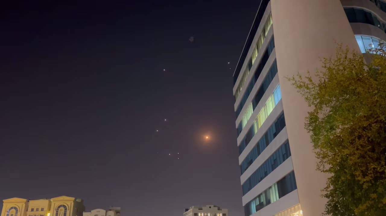 In this frame-grab made from video, missiles and air-defense interceptors illuminate the night sky over Doha after Iran launched an attack on US forces at Al Udeid Air Base in Doha, Qatar on Monday.