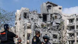 BEERSHEBA, ISRAEL - JUNE 24: Search and rescue teams conduct search and rescue operations at a building that was heavily damaged and partially collapsed by a missile fired from Iran as police take security measures in Beersheba, Israel on June 24, 2025. (Photo by Mostafa Alkharouf/Anadolu via Getty Images)
