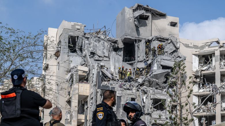 BEERSHEBA, ISRAEL - JUNE 24: Search and rescue teams conduct search and rescue operations at a building that was heavily damaged and partially collapsed by a missile fired from Iran as police take security measures in Beersheba, Israel on June 24, 2025. (Photo by Mostafa Alkharouf/Anadolu via Getty Images)