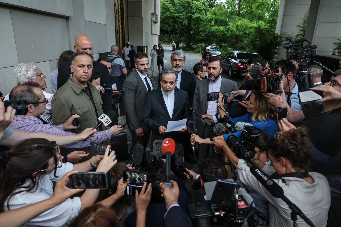 Iran's Foreign Minister Abbas Araghchi (C) speaks to the media after his meeting with the E3 group of European ministers on June 20, 2025 in Geneva, Switzerland.