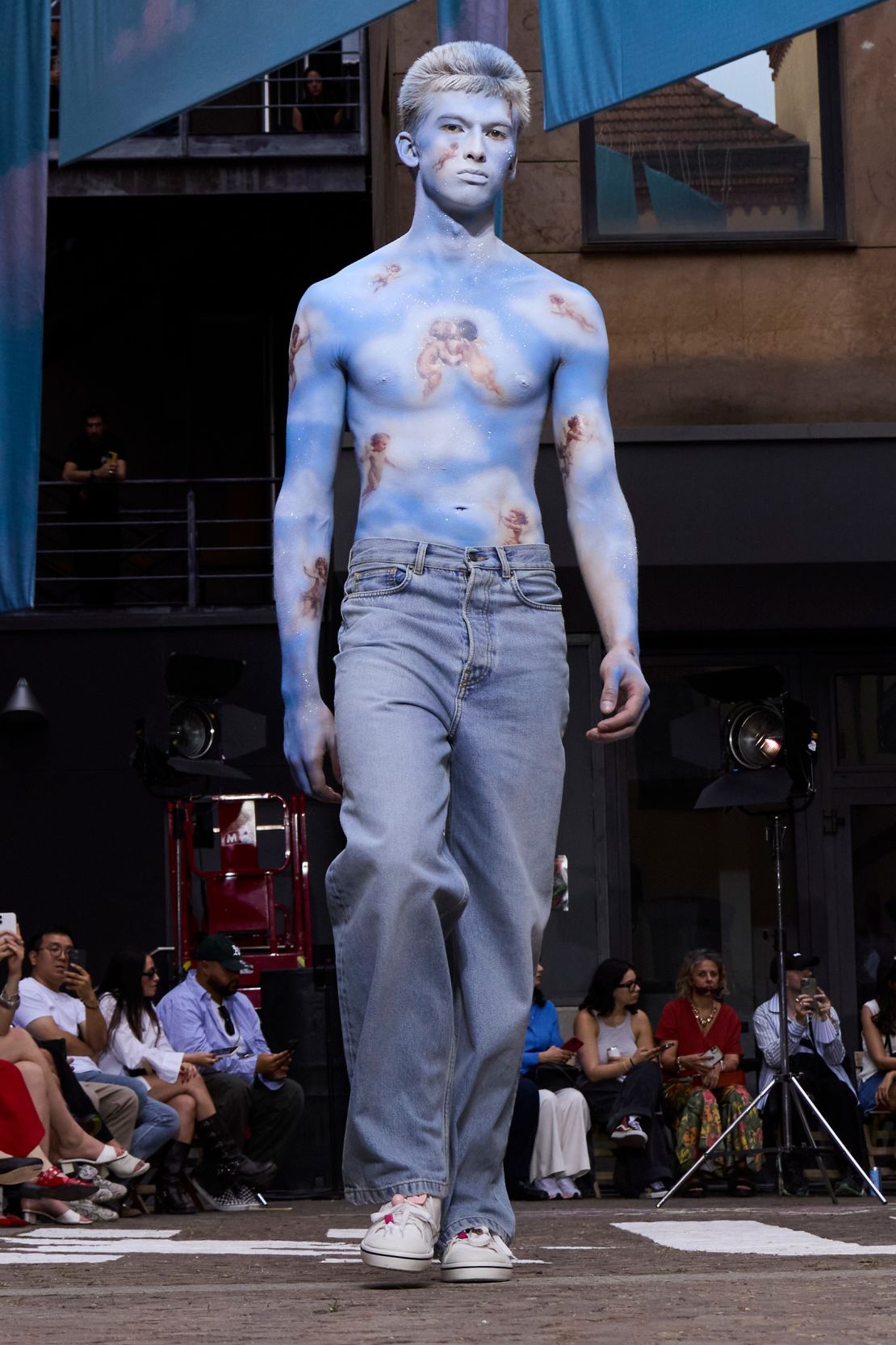 Models were painted with cherubic motifs at Fiorucci.