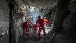 Rescuers sift through the rubble inside in the Evin prison complex in Tehran that was hit days ago by an Israeli strike, on June 25, 2025. The Israeli defence minister announced strikes on the prison and other domestic security agencies in Tehran on June 23. (Photo by Mostafa Roudaki / mizanonline / AFP) (Photo by MOSTAFA ROUDAKI/mizanonline/AFP via Getty Images)          
