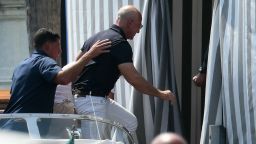 TOPSHOT - Amazon's founder Jeff Bezos arrives at the Aman Hotel in Venice on June 24, 2026. Celebrities in superyachts sail into Venice this week for the three-day wedding party of Amazon tycoon Jeff Bezos and Lauren Sanchez, despite irate locals who say the UNESCO city is no billionaire's playground. The tech magnate and journalist have reportedly invited about 200 guests to their multi-million dollar nuptials in the Italian city, which are expected to kick off on June 26 and end Saturday with a ceremony at a secret location. (Photo by Marco BERTORELLO / AFP) (Photo by MARCO BERTORELLO/AFP via Getty Images)          
