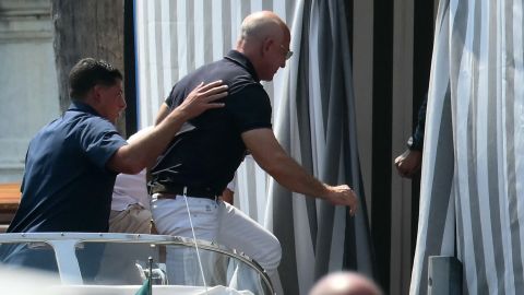 TOPSHOT - Amazon's founder Jeff Bezos arrives at the Aman Hotel in Venice on June 24, 2026. Celebrities in superyachts sail into Venice this week for the three-day wedding party of Amazon tycoon Jeff Bezos and Lauren Sanchez, despite irate locals who say the UNESCO city is no billionaire's playground. The tech magnate and journalist have reportedly invited about 200 guests to their multi-million dollar nuptials in the Italian city, which are expected to kick off on June 26 and end Saturday with a ceremony at a secret location. (Photo by Marco BERTORELLO / AFP) (Photo by MARCO BERTORELLO/AFP via Getty Images)          