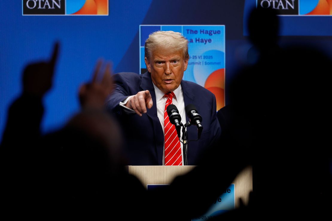 Trump takes questions during a news conference following the summit Wednesday.