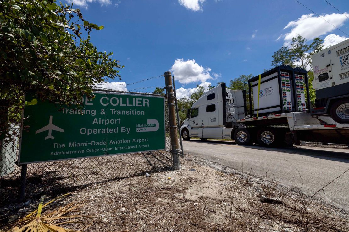 Heavy-duty generators are driven into Dade Collier Training and Transition Airport off Tamiami Trail on Monday, June 24, 2025, in Ochopee, Florida.