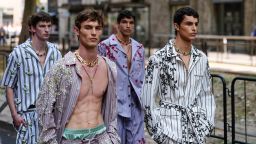 MILAN, ITALY - JUNE 21: Models are walking the runway outside the show venue at Metropol, during Dolce & Gabbana, during the Milan Fashion Week - Menswear Spring/Summer 2026 on June 21, 2025 in Milan, Italy. (Photo by Edward Berthelot/Getty Images)