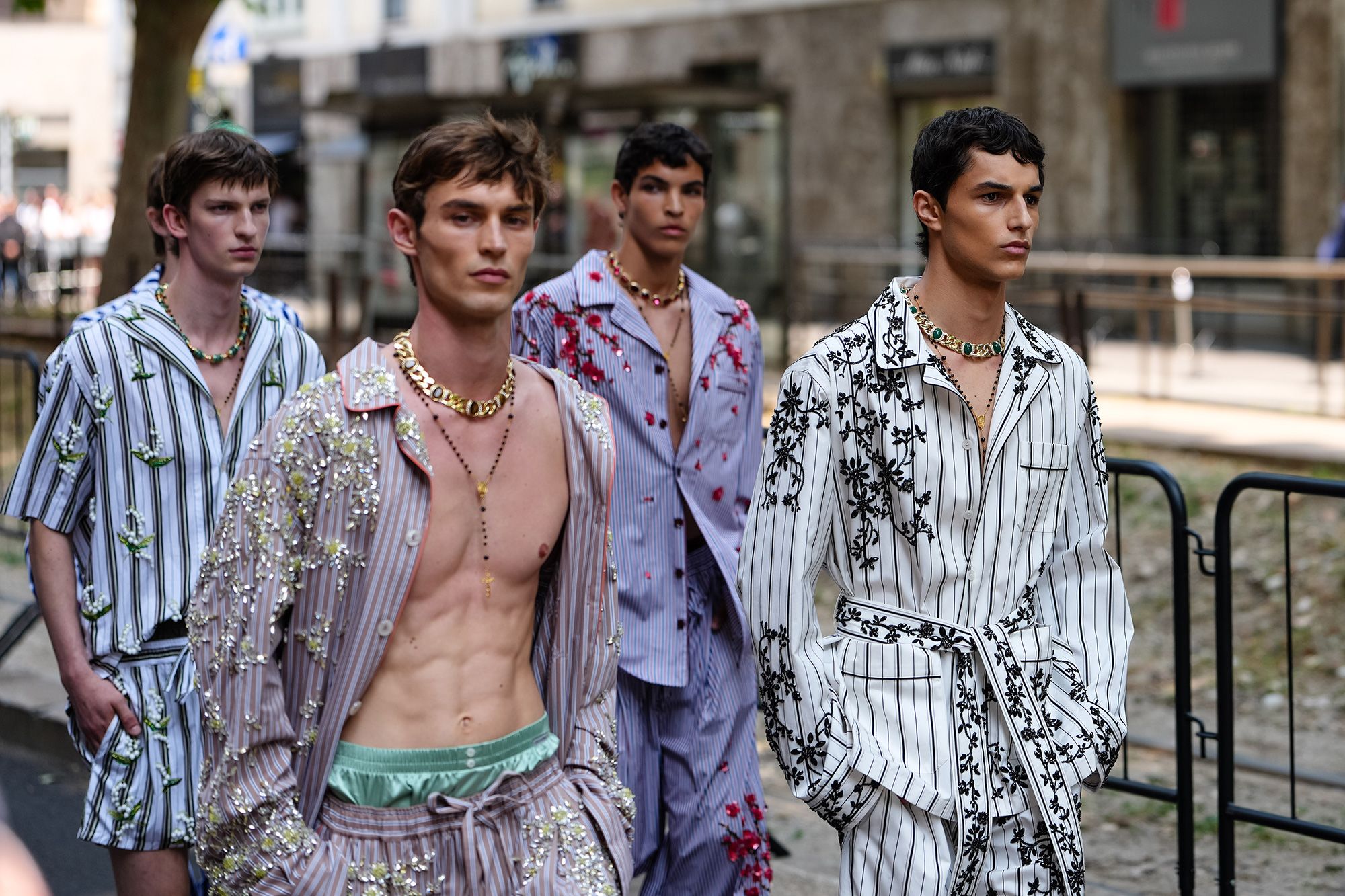 Models walk the runway during Dolce & Gabbana's menswear show at Milan Fashion Week, June 2025.