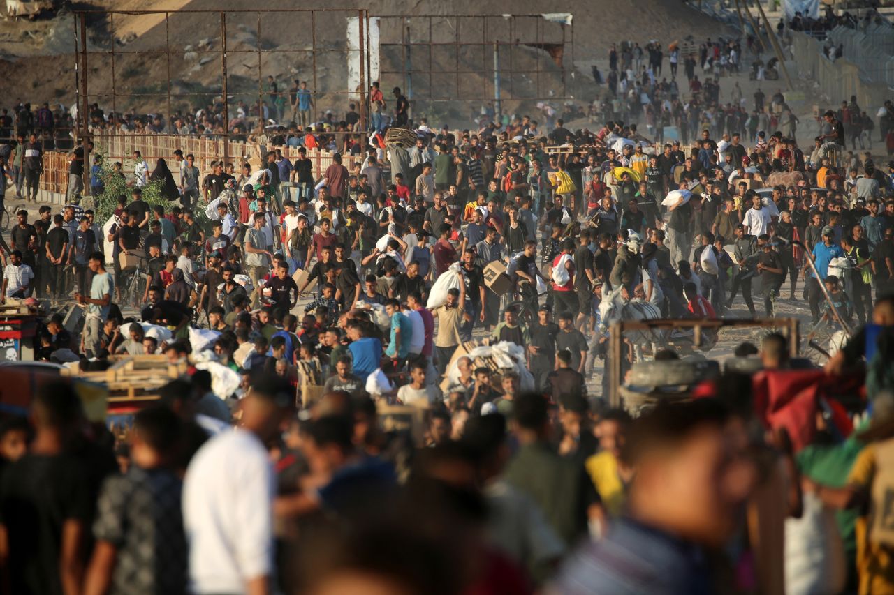 Palestinians gather at an aid distribution point set up by the Gaza Humanitarian Foundation on June 25.
