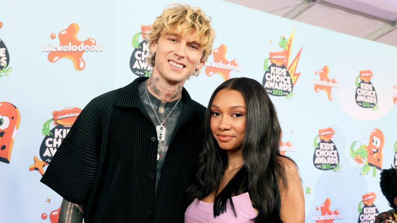 MGK makes rare appearance with teen daughter for whom he is a ‘cheerleader’ - CNN