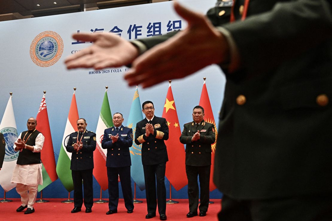 Defense ministers including China's Dong Jun (second from right) gather for a group photo during the SCO defense minister's meeting on Wednesday.