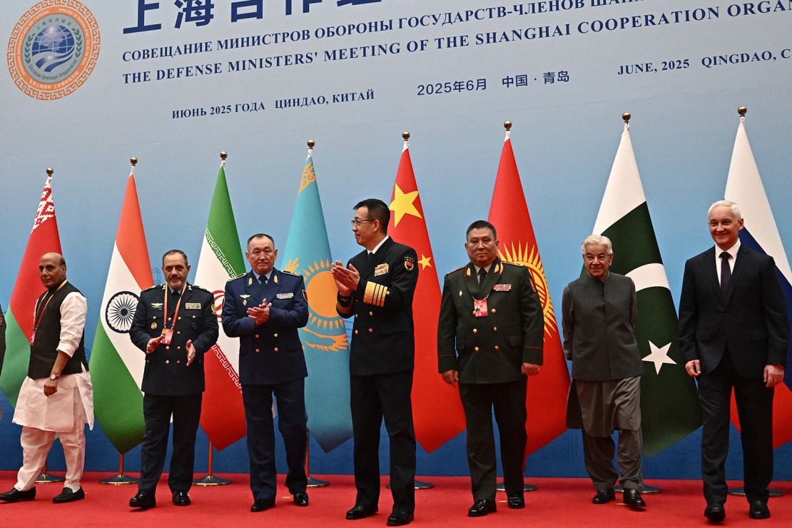 Iran's Defense Minister Aziz Nasirzadeh (second from left) joins SCO counterparts in a meeting in China's Qingdao a day after the Israel-Iran ceasefire last month.