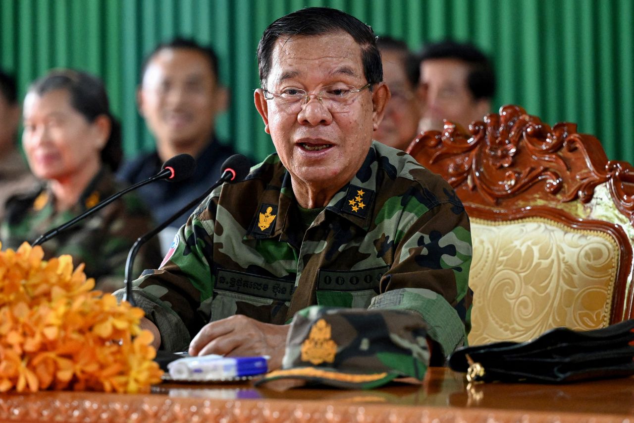 Cambodian Senate President Hun Sen delivers a speech during his visit to Cambodian armed forces stationed along the border with Thailand in Oddar Meanchey province on June 26.