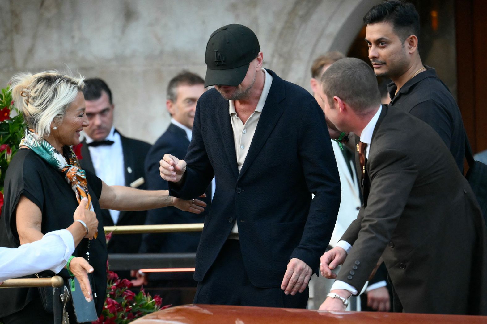 Leonardo DiCaprio leaves the Gritti Palace hotel in Venice on Thursday.