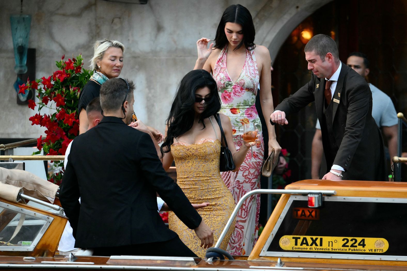 Kendall and Kylie Jenner depart the Gritti Palace hotel on Thursday.