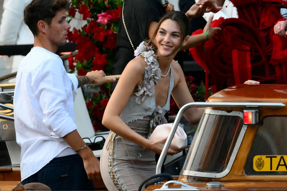 Italian model Vittoria Ceretti stepping into a water taxi.