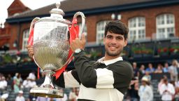 LONDON, ENGLAND - JUNE 22: Carlos Alcaraz of Spain poses for a photo with the HSBC Championships 2025 Winners Trophy following victory over Jiri Lehecka of Czechia in the Men's Singles Final on Day Fourteen of the 2025 HSBC Championships at The Queen's Club on June 22, 2025 in London, England. (Photo by Luke Walker/Getty Images for LTA)