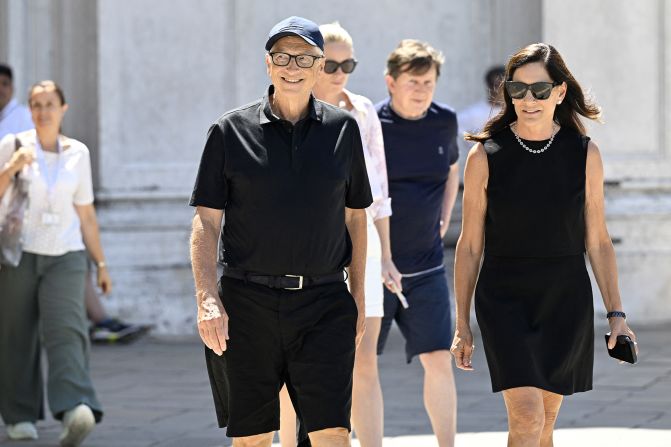 Gates and his partner, Paula Hurd, leave the Gallerie dell'Accademia museum on Friday.