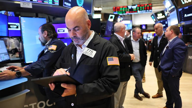 Traders work on the floor of the New York Stock Exchange.