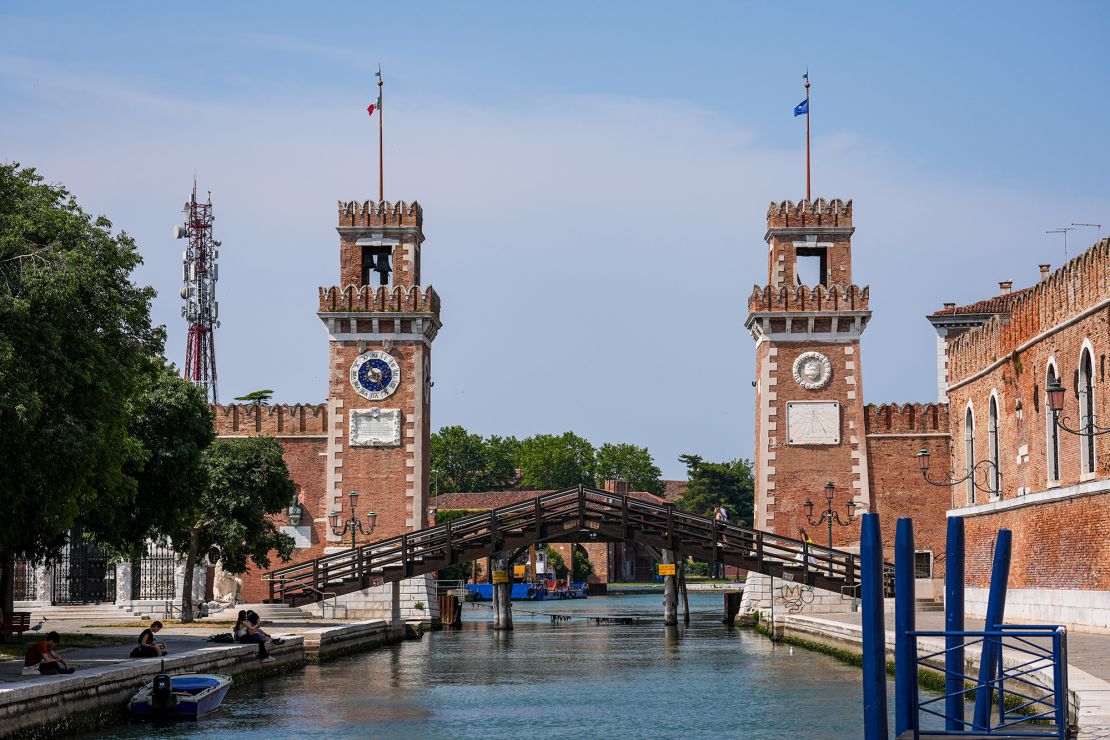 Protesters claim their threats of disruption have resulted in a wedding party venue move to the Arsenale, an area of renovated shipyards on the outskirts of Venice.