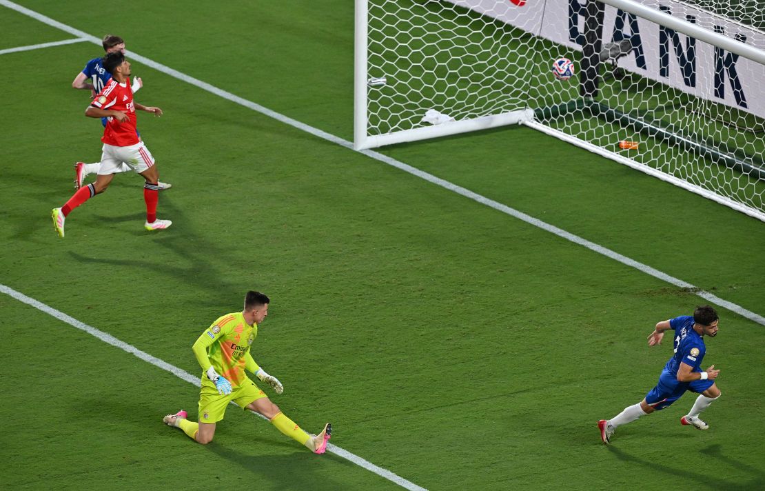 Chelsea winger Pedro Neto celebrates scoring his team's third goal.