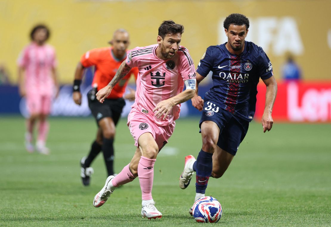 Inter Miami's Lionel Messi and Paris Saint-Germain's Warren Zaire-Emery fight for the ball during the FIFA Club World Cup 2025.