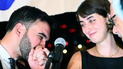 NEW YORK, NEW YORK - JUNE 24: New York mayoral candidate, State Rep. Zohran Mamdani (D-NY) kisses the hand of his wife Rama Duwaji as they celebrate during an election night gathering at The Greats of Craft LIC on June 24, 2025 in the Long Island City neighborhood of the Queens borough in New York City. Mamdani was announced as the winner of the Democratic nomination for mayor in a crowded field in the City’s mayoral primary to choose a successor to Mayor Eric Adams, who is running for re-election on an independent ticket. (Photo by Michael M. Santiago/Getty Images)
