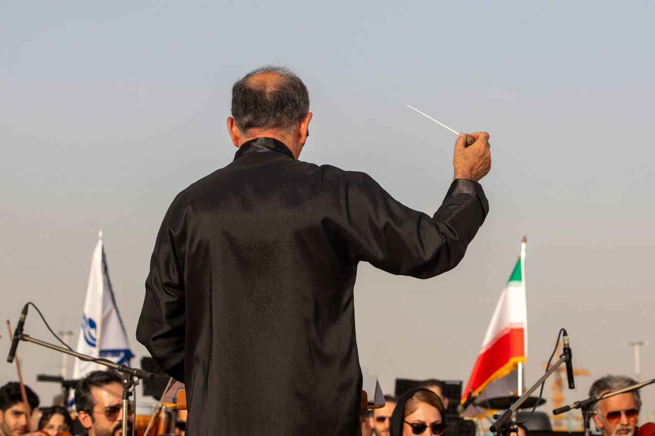 The Tehran Symphony Orchestra perform five pieces in Tehran's Azadi Square on Wednesday.