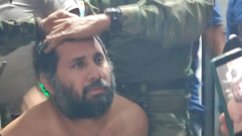 MANTA, ECUADOR - JUNE 25: (EDITOR'S NOTE: This Handout image was provided by a third-party organization and may not adhere to Getty Images' editorial policy.) In this Handout image provided by the armed forces of Ecuador, José Adolfo 'Fito' Macías, Head of criminal organization Los Choneros, is recaptured by members of the Ecuador's Armed Forces on June 25, 2025 in Manta, Ecuador. Macias, also known as Fito, who was currently serving a 34-year prison sentence for drug trafficking and homicide related crimes, managed to escape from the Guayaquil regional prison in January 2024 to avoid his transfer to a maximum security section of the facility. Fito's escape sparked an escalation of violence in Ecuador. (Photo by Handout/Getty Images)
