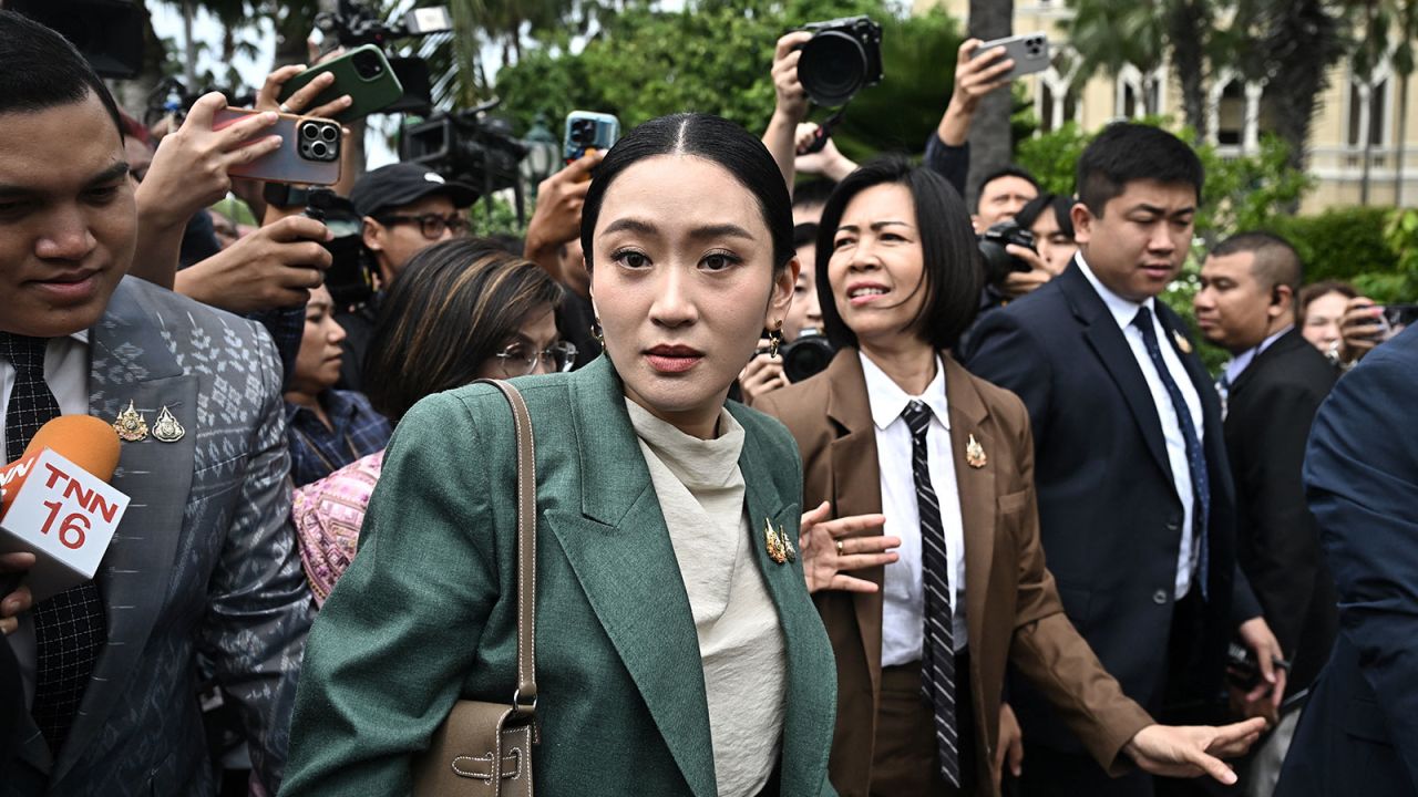 Thailand's Prime Minister Paetongtarn Shinawatra walks through the Government House after a cabinet meeting in Bangkok on July 1, 2025.