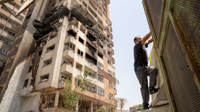 TEHRAN, IRAN - JUNE 26: An exterior view shows the extent of damage at a residential building in the Saadat Abad neighborhood of Tehran that was struck by an Israeli attack on June 13, resulting in the death of Dr. Tehranchi, the president of Azad University, and 16 civilians on June 26, 2025 in Tehran, Iran. A cease-fire between Israel and Iran has brought an end to 12 days of daily aerial attacks that started with Israel's strikes on Iranian military and nuclear sites on June 13. (Photo by Majid Saeedi/Getty Images)