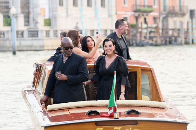 Gamble and Kris Jenner ride a taxi boat as they leave the Gritti Palace hotel on Thursday.