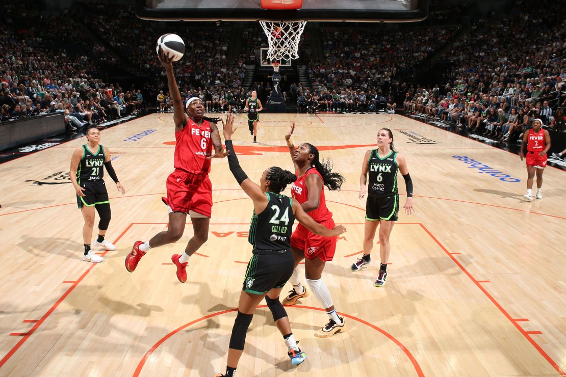 Natasha Howard of the Indiana Fever drives to the basket during the game against the Minnesota Lynx.