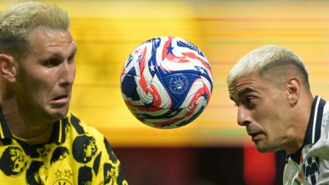 El defensor alemán del Borussia Dortmund #25 Niklas Suele (L) y el delantero mexicano del Monterrey #07 German Berterame (R) luchan por el balón durante el partido de octavos de final de la Copa Mundial de Clubes de la FIFA 2025 entre el Borussia Dortmund de Alemania y el Monterrey de México en el estadio Mercedes-Benz de Atlanta el 1 de julio de 2025.