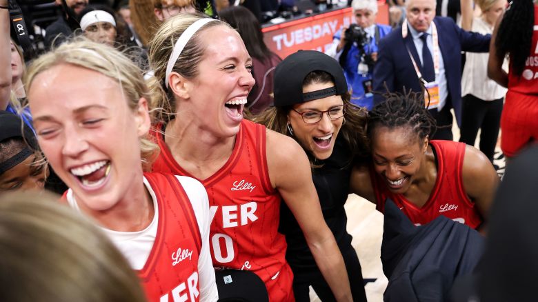Indiana Fever head coach Stephanie White celebrates with Lexie Hull and Aari McDonald after their team's win against the Minnesota Lynx in the championship game of the 2025 Commissioners Cup in Minneapolis, Minnesota, on July 1, 2025.