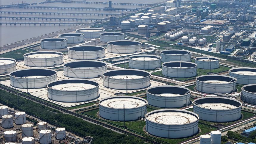 Oil storage tanks at a petrochemical production base on the outskirts of Shanghai, China, in June.