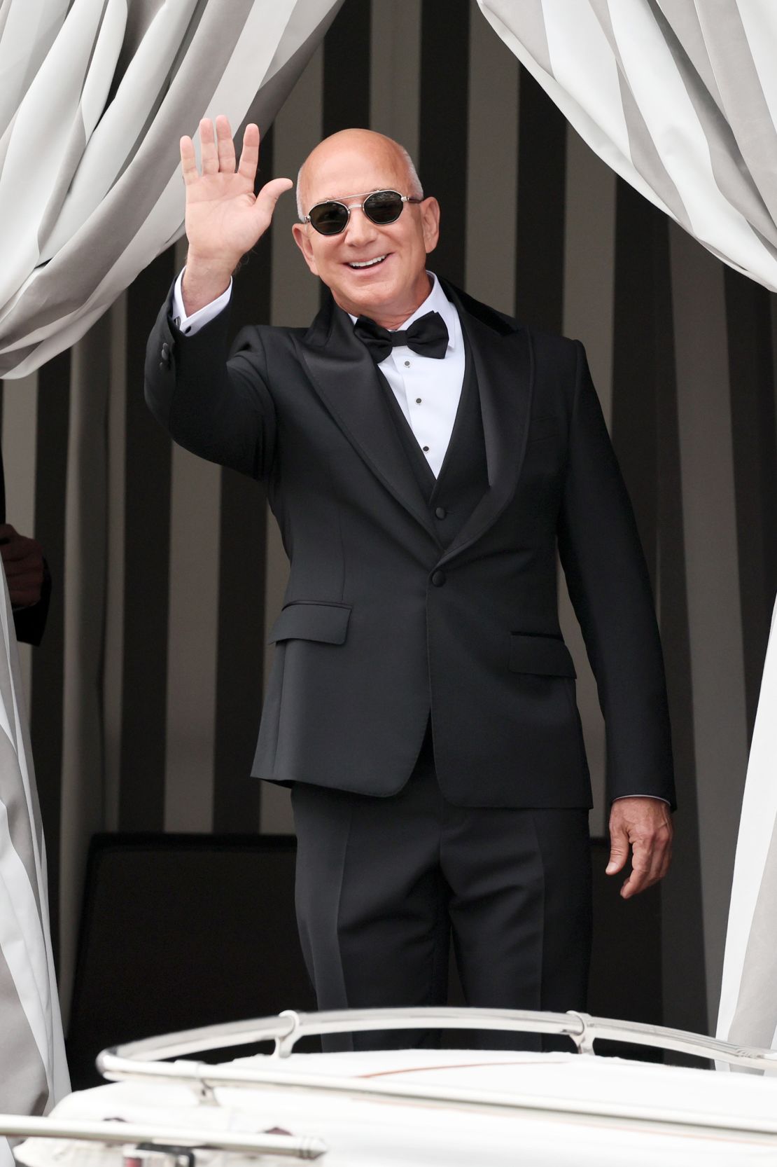 Jeff Bezos leaves the Aman Hotel on his way to San Giorgio Maggiore in a classic black tuxedo.